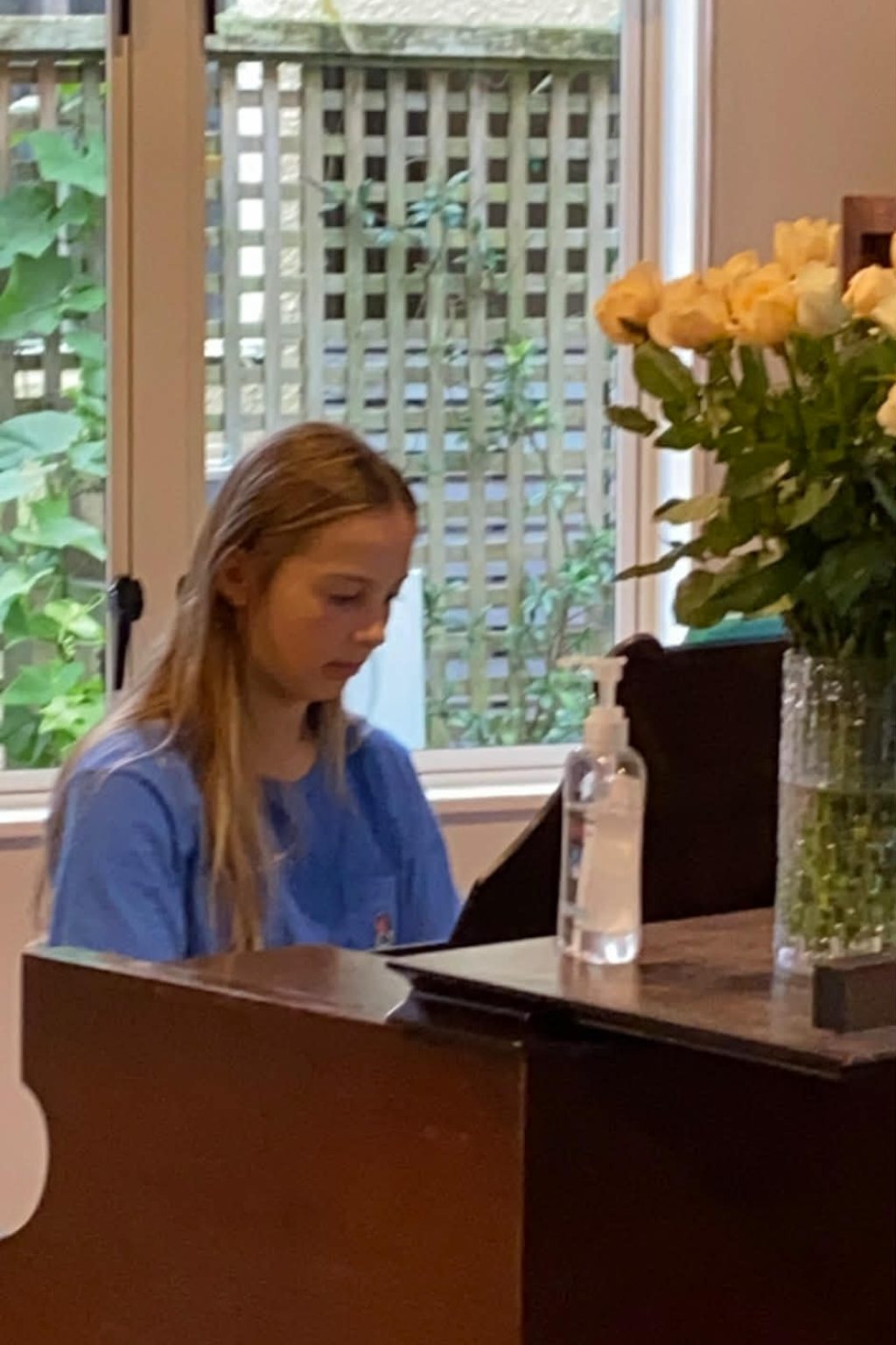 A student playing the piano